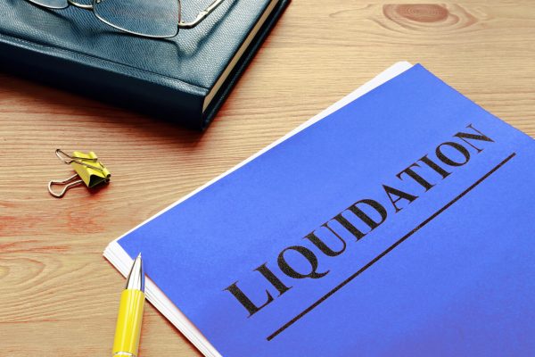 The word liquidation is printed on the red page.